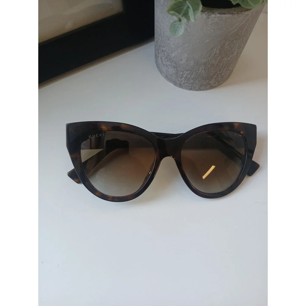 Gucci Tortoiseshell Cat Eye Sunglasses with Gold Accents
